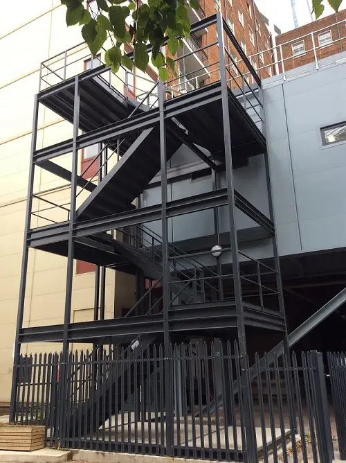 Black external stairs to building, 24 Hour Welding